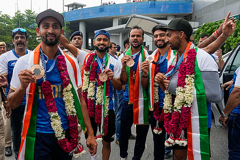 Indian hockey bronze medalist on their arrival at the Indira Gandhi International Airport
